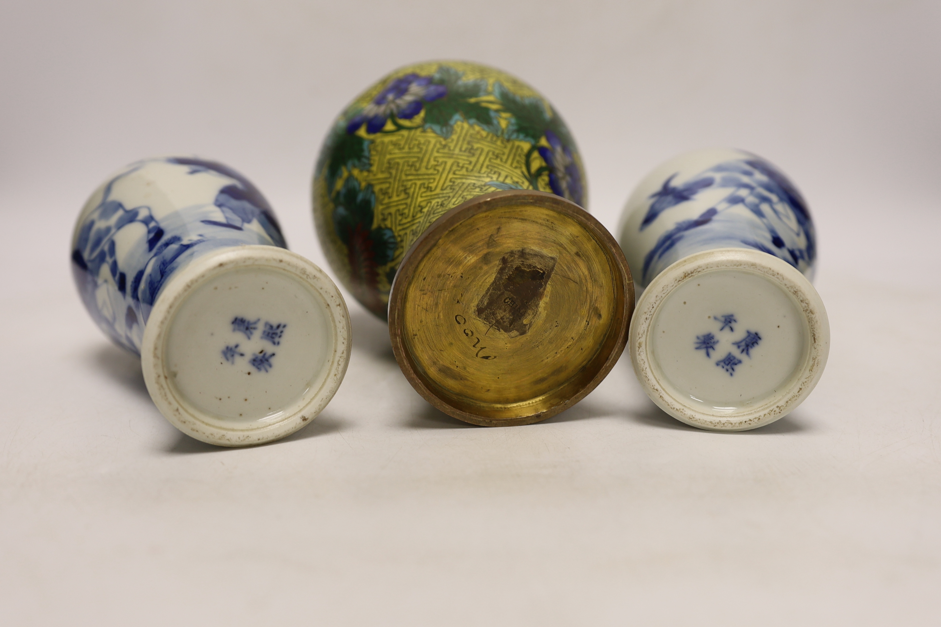 A pair of Chinese blue and white vases, c.1900 and a Chinese cloisonné enamel vase, largest 24cm high